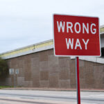 wrong way sign along highway