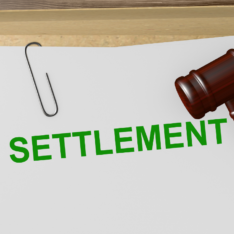 Settlement folder with gavel