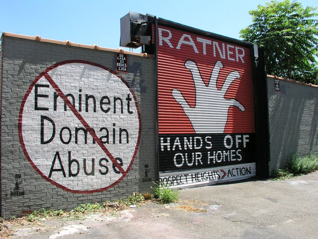 A condemned property protesting against eminent domain abuse.