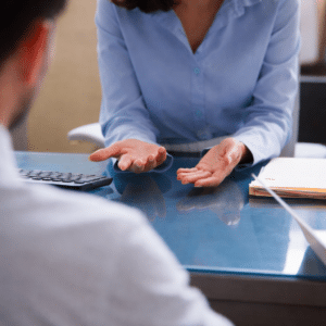 Woman at the insurance office for settlement negotiations
